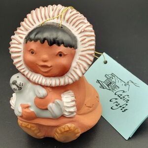 American Eskimo Kipmeelick Boy w/Seal Clay figure By Cabin Crafts Homer, Alaska